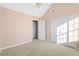 Bright bedroom with ample closet space and large window for natural light at 6422 Phillips Ct, Lithonia, GA 30058