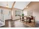 Elegant dining room features a large window, hardwood floors, and seating for six at 6422 Phillips Ct, Lithonia, GA 30058