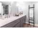 Bathroom featuring and sinks, granite countertops, and a decorative ladder at 6851 Roswell Rd # A-12, Atlanta, GA 30328