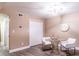 Bright dining area featuring a modern chandelier, and seating for two at 6851 Roswell Rd # A-12, Atlanta, GA 30328