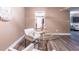 Elegant dining area adjacent to the living room and kitchen at 6851 Roswell Rd # A-12, Atlanta, GA 30328