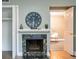 Cozy living room with a fireplace and adjacent room at 6851 Roswell Rd # A-12, Atlanta, GA 30328