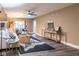 Charming living room featuring neutral walls, a ceiling fan and luxury vinyl plank flooring at 6851 Roswell Rd # A-12, Atlanta, GA 30328