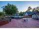 Pool area offering seating and umbrellas, nestled amid lush greenery at 6851 Roswell Rd # A-12, Atlanta, GA 30328