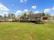 Spacious backyard features a deck and mature trees at 2610 Betty Jean Dr, Jonesboro, GA 30236
