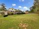 Expansive backyard with a deck and mature trees at 2610 Betty Jean Dr, Jonesboro, GA 30236