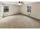 Bright bedroom with two windows and ample space at 2610 Betty Jean Dr, Jonesboro, GA 30236