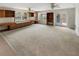 Large bonus room with built-in desks, cabinets and bright windows at 2610 Betty Jean Dr, Jonesboro, GA 30236