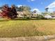 Well-manicured front yard with lush lawn and mature landscaping at 2610 Betty Jean Dr, Jonesboro, GA 30236