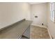 Functional laundry room with counter space and vinyl flooring at 2610 Betty Jean Dr, Jonesboro, GA 30236