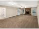 Spacious living room featuring a brick fireplace and large windows at 2610 Betty Jean Dr, Jonesboro, GA 30236