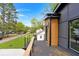 Outdoor balcony offers a peaceful retreat with views of the surrounding neighborhood and green space at 1598 Athens Ave, Atlanta, GA 30310