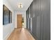 Stylish hallway boasting hardwood floors, striking wall art, and a unique accent wall design at 1598 Athens Ave, Atlanta, GA 30310