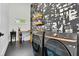 Contemporary laundry room with black/gold washer and dryer, floating shelves, and a sleek design at 1598 Athens Ave, Atlanta, GA 30310