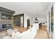 Spacious living area with fireplace, hardwood floors, and an open view to the kitchen at 1598 Athens Ave, Atlanta, GA 30310