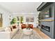 Inviting living room showcasing a fireplace, modern furnishings, and ample natural light at 1598 Athens Ave, Atlanta, GA 30310