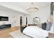 Elegant main bedroom features hardwood floors, large windows, and a view to the luxurious bathroom and walk-in closet at 1598 Athens Ave, Atlanta, GA 30310
