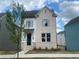 Charming two-story home with brick and siding exterior, manicured lawn, and inviting entrance at 2721 Creek View Nw Ter, Atlanta, GA 30318