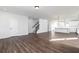 Open concept living space with staircase, and beautiful, wood-look flooring at 2721 Creek View Nw Ter, Atlanta, GA 30318