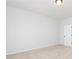 Minimalist bedroom with neutral carpeting and a bright, airy feel at 2725 Creek View Nw Ter, Atlanta, GA 30318