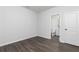 Bedroom with vinyl floors and white walls at 2725 Creek View Nw Ter, Atlanta, GA 30318
