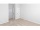 Bedroom with neutral carpet, white walls, a closet, and a window at 2725 Creek View Nw Ter, Atlanta, GA 30318