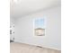 Bright bedroom with a large window offering views of the surrounding neighborhood at 2725 Creek View Nw Ter, Atlanta, GA 30318