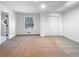 Spacious bedroom features a ceiling fan, a double door closet, and a window view at 3248 Holly Mill Run, Marietta, GA 30062