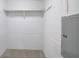 Walk-in closet with a shelf for storage at 643 Tumlin Lake Rd, Temple, GA 30179
