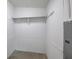 Walk-in closet with a shelf for storage at 643 Tumlin Lake Rd, Temple, GA 30179