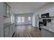 Modern kitchen with granite counters and stainless steel appliances at 643 Tumlin Lake Rd, Temple, GA 30179