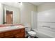 This bathroom features a vanity, toilet, and bathtub with a shower at 109 Odyssey, Conyers, GA 30012