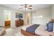 Cozy bedroom boasts modern furniture and decor, with ensuite bath and walk-in closet at 109 Odyssey, Conyers, GA 30012