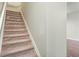 Carpeted staircase leading to the upper level at 109 Odyssey, Conyers, GA 30012