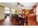 Dining area with hardwood floors adjacent to the kitchen and living room, offering an open-concept layout at 4151 Valley Wood Nw Dr, Marietta, GA 30064