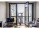 Intimate balcony view with access from the living area, featuring outdoor seating at 5300 Peachtree Rd # 3206, Atlanta, GA 30341