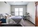 Bright bedroom featuring a comfortable bed, a well-lit workspace, and a neutral color palette at 5300 Peachtree Rd # 3206, Atlanta, GA 30341