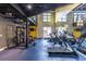 Community gym with weights, treadmills, and other exercise machines in a bright, open space at 5300 Peachtree Rd # 3206, Atlanta, GA 30341