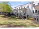 Backyard with manicured lawn and outdoor seating areas providing a serene outdoor experience at 1337 Grey Fox Ne Ct, Atlanta, GA 30306