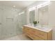 Contemporary bathroom with glass-enclosed shower and double vanity at 1337 Grey Fox Ne Ct, Atlanta, GA 30306