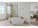 Bathroom featuring a soaking tub and luxurious walk-in shower at 1337 Grey Fox Ne Ct, Atlanta, GA 30306