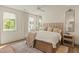 Tranquil bedroom with neutral tones, natural light, and plush bedding at 1337 Grey Fox Ne Ct, Atlanta, GA 30306