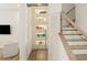 Hallway view featuring stairs, a cozy nook, and seamless integration with other rooms at 1337 Grey Fox Ne Ct, Atlanta, GA 30306