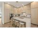 Modern kitchen featuring stainless steel appliances, quartz countertops, and a breakfast bar with seating at 1337 Grey Fox Ne Ct, Atlanta, GA 30306