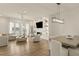 Modern living and dining areas with fireplace, built-in shelving, and contemporary furnishings at 1337 Grey Fox Ne Ct, Atlanta, GA 30306