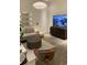 Cozy living room features neutral colors, modern entertainment center, and stylish decor at 1337 Grey Fox Ne Ct, Atlanta, GA 30306