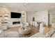 Inviting living room featuring modern fireplace, built-in shelving, and comfortable seating arrangement at 1337 Grey Fox Ne Ct, Atlanta, GA 30306