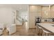 Spacious living area flowing into a modern kitchen with stainless steel appliances and sleek design at 1337 Grey Fox Ne Ct, Atlanta, GA 30306