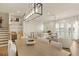 Open-concept living space features a dining area, bar, and living room with French doors at 1337 Grey Fox Ne Ct, Atlanta, GA 30306