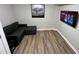 Cozy living room boasts wood floors, neutral walls, and modern furnishings for a relaxing atmosphere at 418 Robinson Rd, Peachtree City, GA 30269